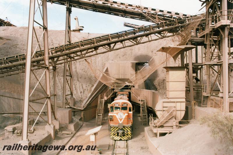 P12542
Newman, Whaleback mine site, Alco M636 class 5469 exiting the Loadout Tunnel 2 during train loading procedure
