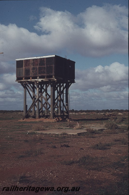 P13007
Water tower with a 25,000 gallon cast iron tank, Broad Arrow, KL line, abandoned, tank painted black
