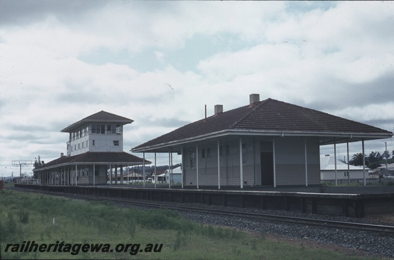 P13037
Station buildings, elevated signal box, Brunswick Junction, SWR line, west side and south end view.
