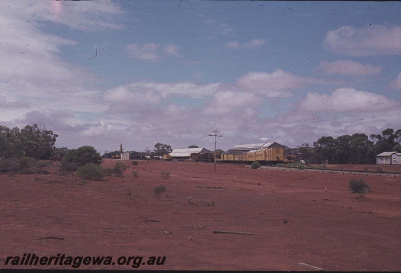 P13127
Siding with work train, Gutha, EM line, overall distant view of the siding showing the Out of Shed and wheat bins
