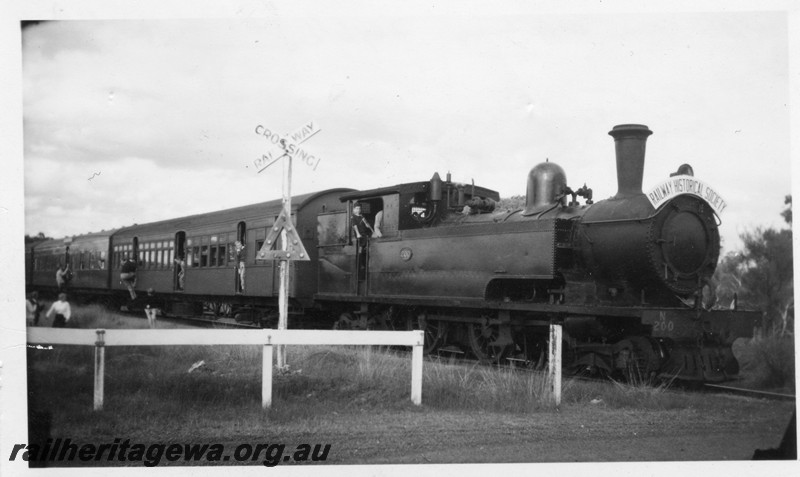 P13345
N class 200, 4-4-4T steam locomotive, stopped at a level crossing for a photo stop five miles from Armadale, SWR line, ARHS tour train
