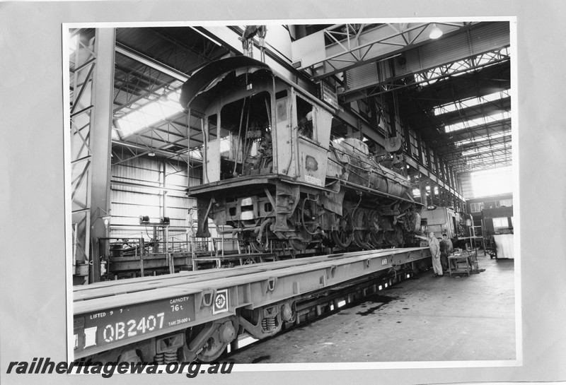 P13606
W class 901 less tender on standard gauge flat wagon being prepared for transportation to South Australia, Forrestfield Yard.
