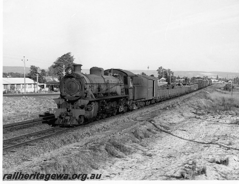 P14611
W class 917, Welshpool, SWR line, goods train, all steel FD class 14292 behind the loco with its door open.
