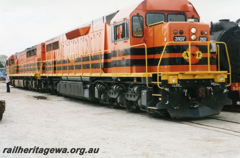P15003
L Class 3107 in ARG ownership, at Railfest, Rail Transport Museum, side and front view.
