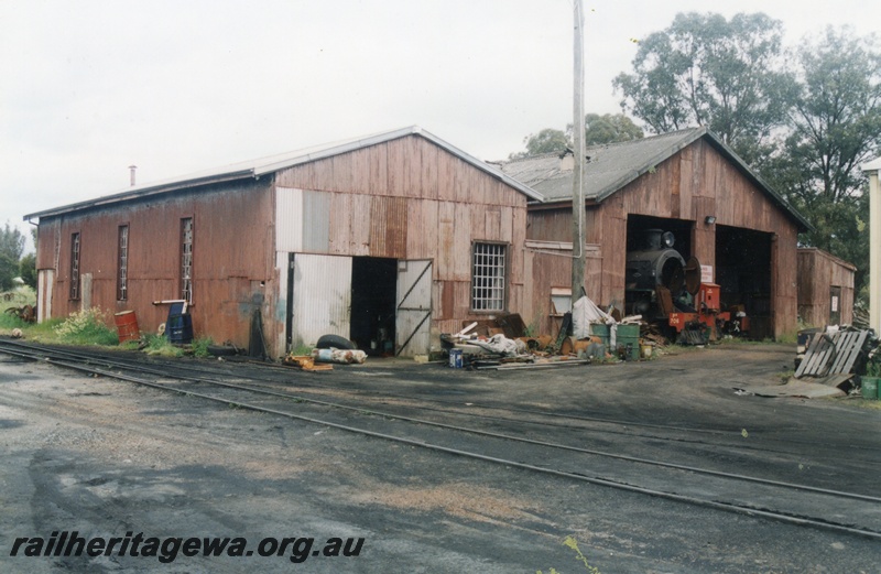 P15185
1 of 6 images of showing the Hotham Valley Railway's use of the facilities at Pinjarra, SWR line. PM class 706 protruding out of the loco shed, view from across the tracks
