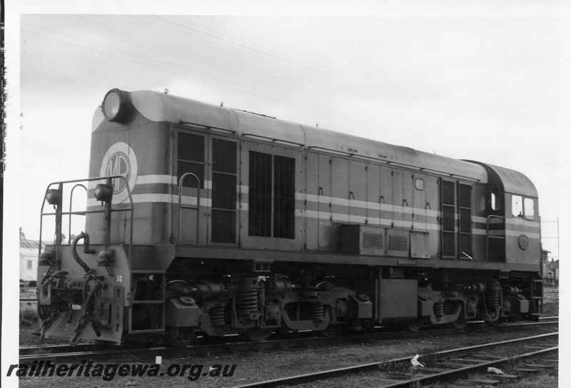P15386
G class 50 diesel locomotive in Midland Railway colours of maroon and cream at Midland Workshops. The MR emblem is circled on the nose of the locomotive.
