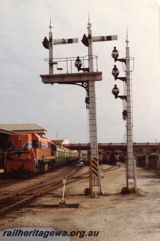 P15449
DA class 157 3 heading ARHS tour train to Jarrahdale, front and side view, bracket signal, signal pole with three shunting dollies, Little Davids point lever, looking towards Platform 7, Perth Station. 
