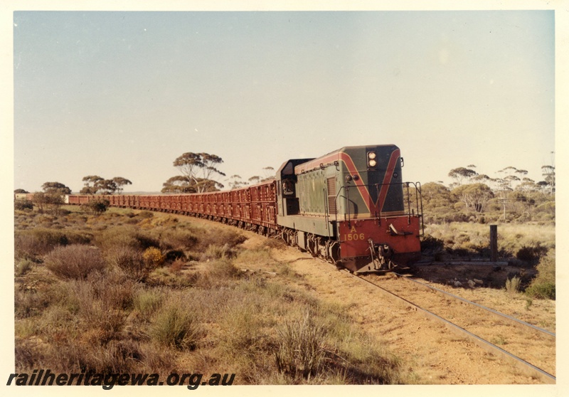 P15943
A class 1506, in green with red and yellow stripe, on the 