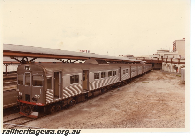 P16052
Three railcar set headed by ADK class 682, in stainless steel, Horseshoe Bridge, Perth station, front and side view
