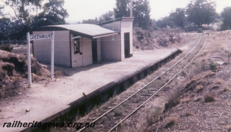 P16115
Station buildings, nameboard, Greenmount Station after closure, M line, end and trackside view.
