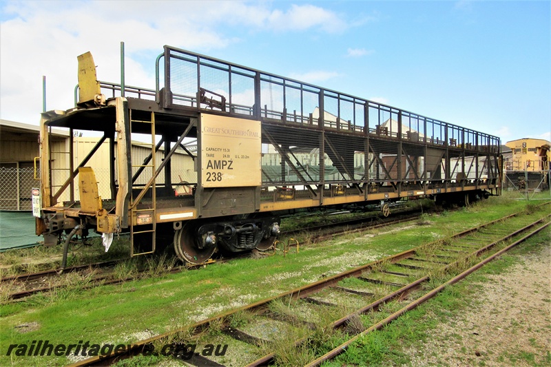 P16194
Great Southern Rail  AMPZ class 238, car transporter parked on the track passing through the Rail Transport Museum awaiting servicing at UGL, end and side view
