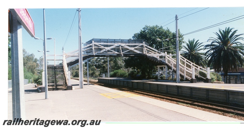 P16309
Overhead footbridge, platforms, lamps, station nameboard (part), West Leederville station, ER line
