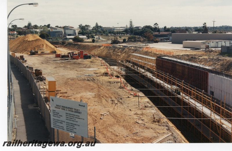 P16650
Site of the sinking of the Perth to Fremantle railway line at Subiaco, Subiaco Redevelopment Project, ER line, elevated view of tunnel under construction

