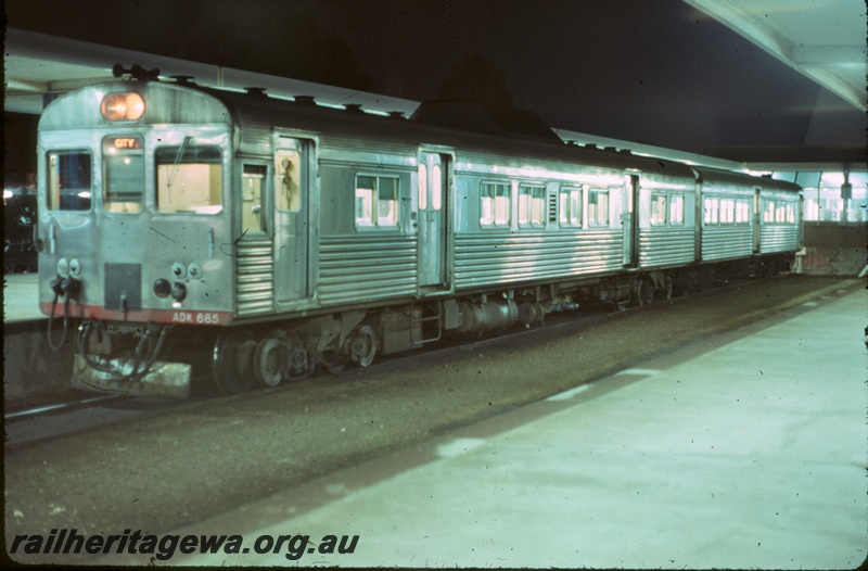 P16660
ADK class 685 railcar, with another car, about to depart for the city, platforms, roof, Midland station, ER line, front and side view
