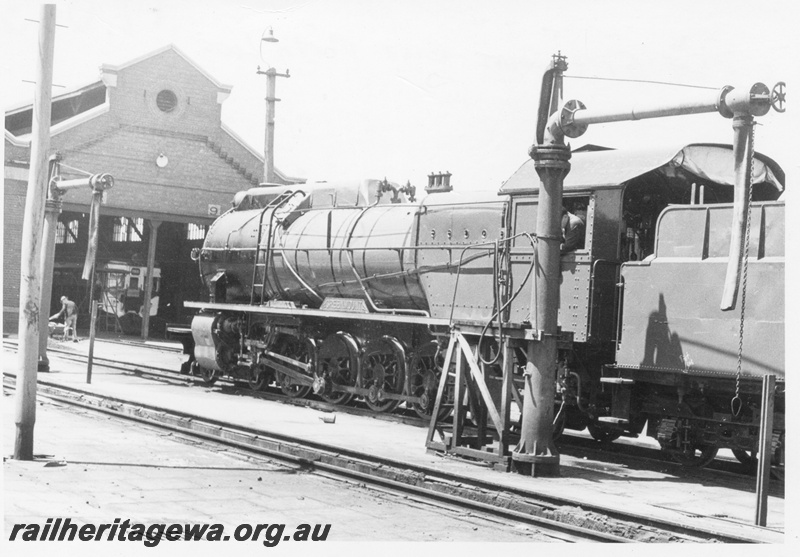 P17043
S class 549 Greenmount at East Perth Loco. Note the suburban railcar in the shed and the water column & stand next to the locomotive.
