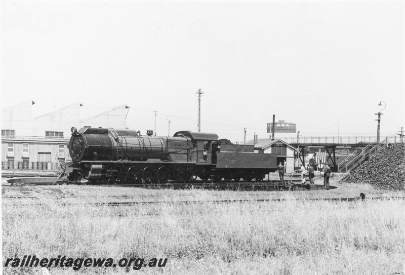 P17046
S class 549 Greenmount on the turntable at East Perth Loco with manual power in operation. Footbridge in the background and top portion of gasometer in background.
