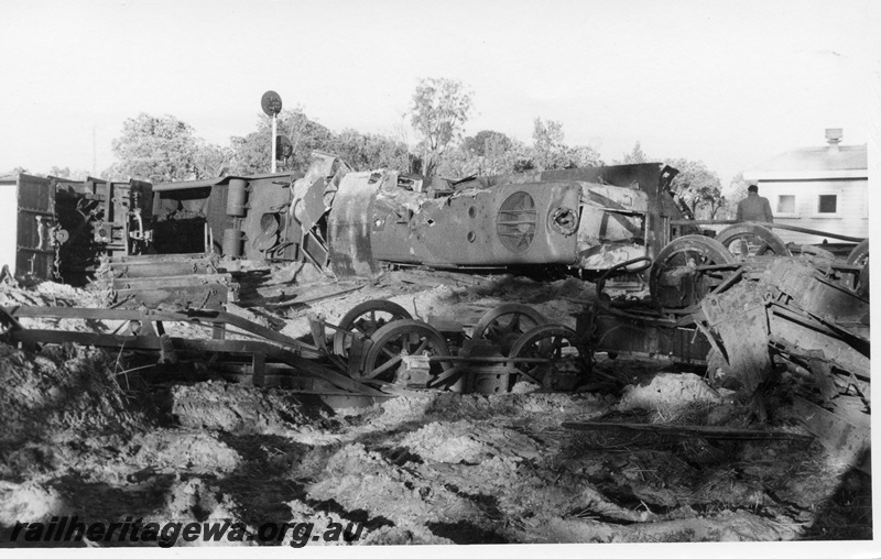 P17120
V class 1206 and Y class 1105 derailed and laying on their sides as a result of a collision between their  goods train and an empty bauxite train in the early hours of 20/4/1968, Mundijong Junction, SWR line.ne

