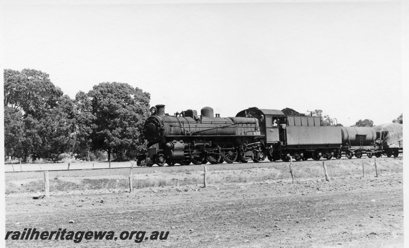 P17387
PMR class 713 steam locomotive on 108 Goods. BN Line. Location Unknown. Note J class water tanker behind loco and distant side view of locomotive.
