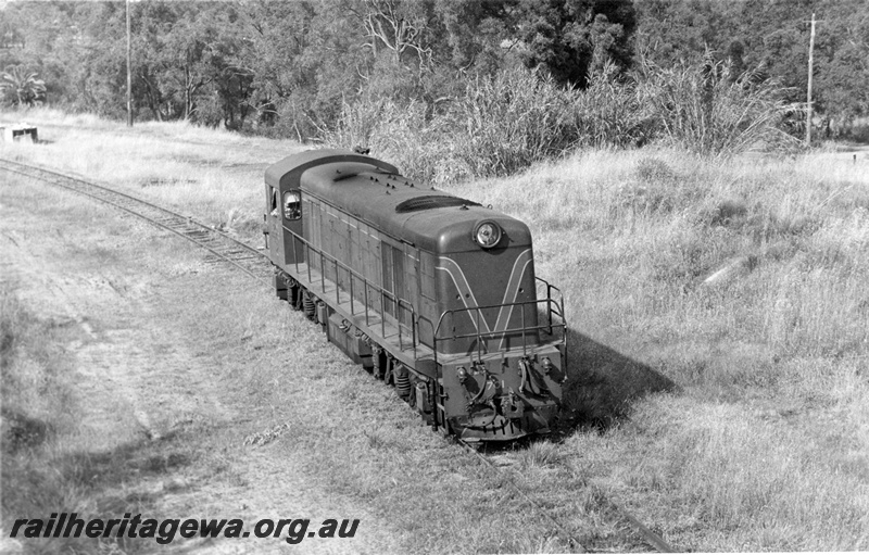 P17752
8 of 9 Rail reclamation on old ER line. C class 1701, running light, on reclamation duties, Swan View, ER line, side and front view from elevated position
