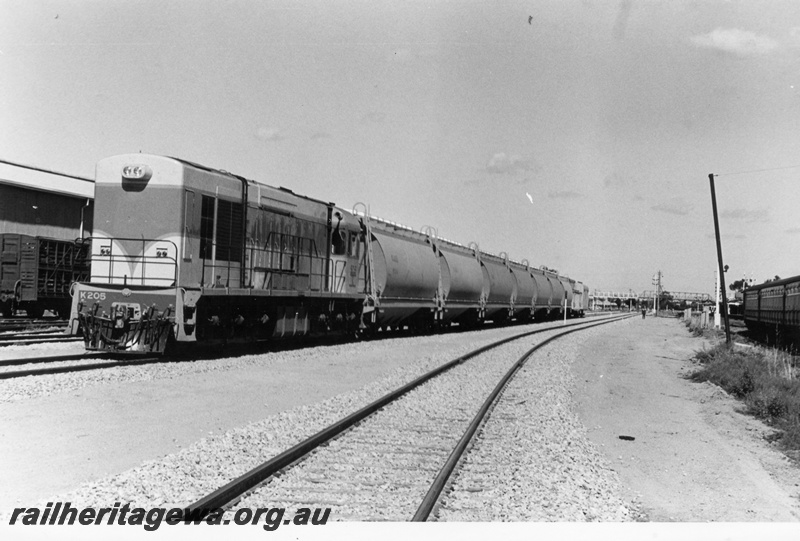 P17897
K class 205, heading grain train, light signal, overhead bridge, Midland, ER line
