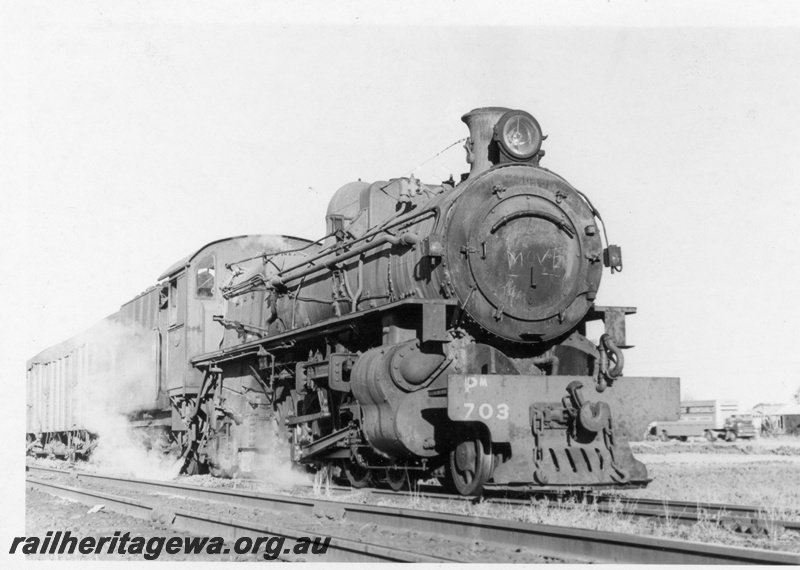 P18411
PM class 703 with a PR class dome on No. 79 goods train, leaving Baandee, EGR line, side and front view
