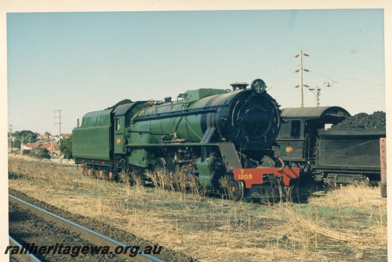 P18414
V class 1205, East Perth loco shed, side and front view
