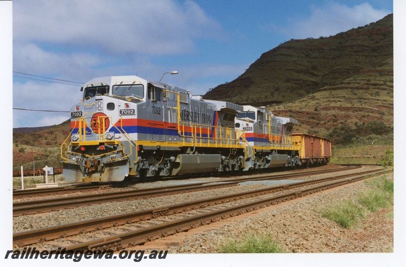 P18886
Hamersley Iron (HI) C44-9W class 7092 & 7065 at load out Mount Tom Price.
