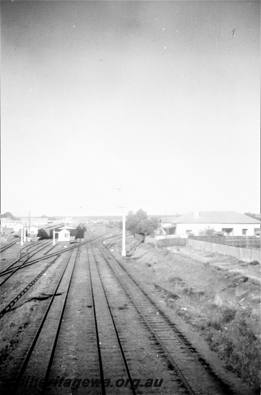 P19525
Platforms, canopies, sidings, signals, Kalgoorlie station, EGR line, view looking west from Maritana Street bridge
