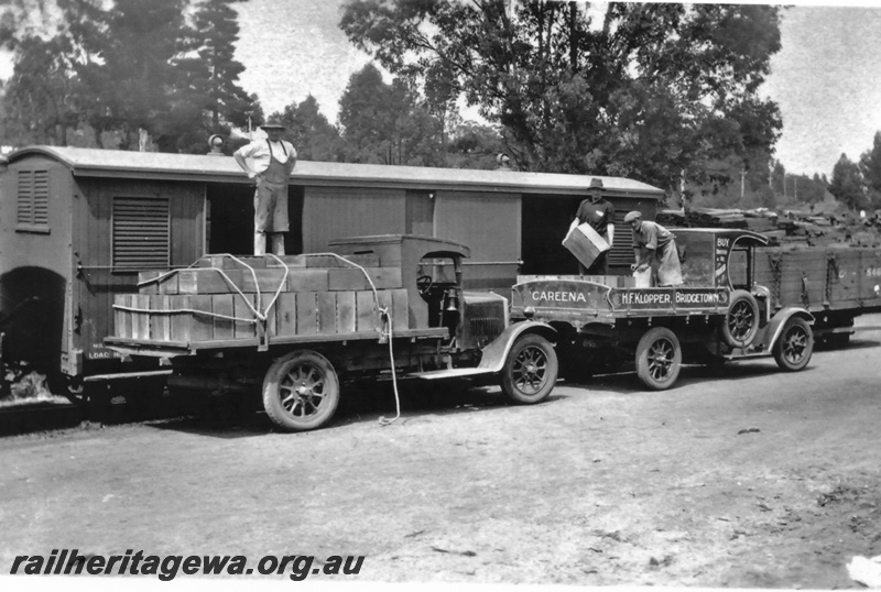 P19617
Bridgetown station yard - loading fruit from H .F. Klopper truck into railway wagon. PP line 
