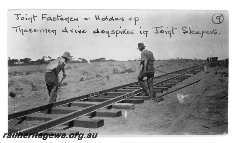 P19667
Installing dog spikes and fish plates. Location unknown.
