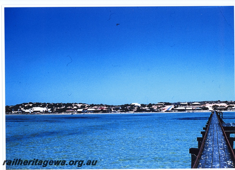P20028
Jetty with railway track, view  back along the jetty across Freycinet Reach, Town of Denham in the background
