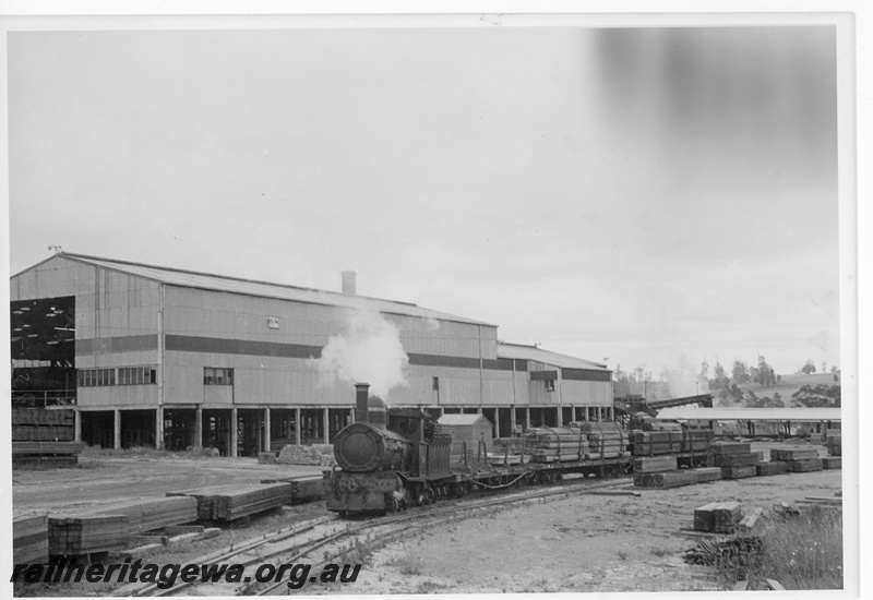 P20209
State Saw Mills loco SSM No 2 locomotive at Pemberton timber Mill , hauling sawn timber to the WAGR siding. PP line.
