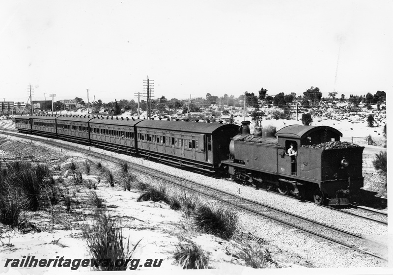 P20804
D class 373, bunker first, on passenger train comprising AU class, two AT class, AS class and AF class carriages, Bayswater, ER line, side and front view of train 
