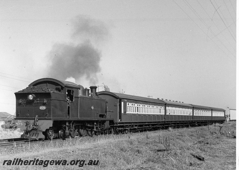P20806
DS class 375, bunker first, on passenger train comprising AS class, two AT class and AU class carriages, signal, trackside building, Queens Park, SWR line, front and side view
