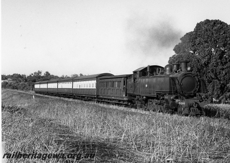 P20817
DD class 596 on passenger train comprising AD, 4 AT and AU class carriages, approaching Daglish station, ER line, side and front view
