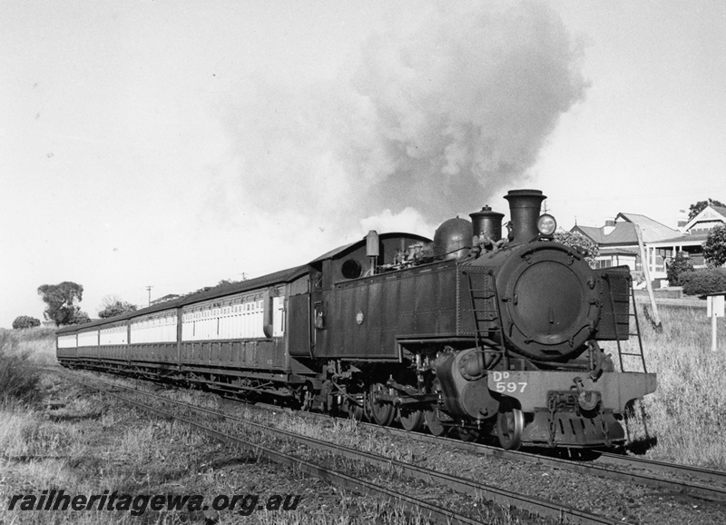 P20819
DD class 597, on passenger train comprising AU and 4 AT class carriages, houses,  Mt Lawley, ER line, side and front view 
