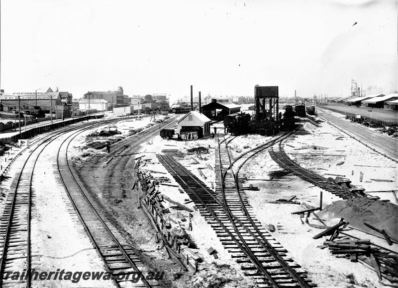 P20843
Locomotive depot, yard, water tower, tracks, sheds, buildings, warehouses, Fremantle, ER line, elevated view, c1908
