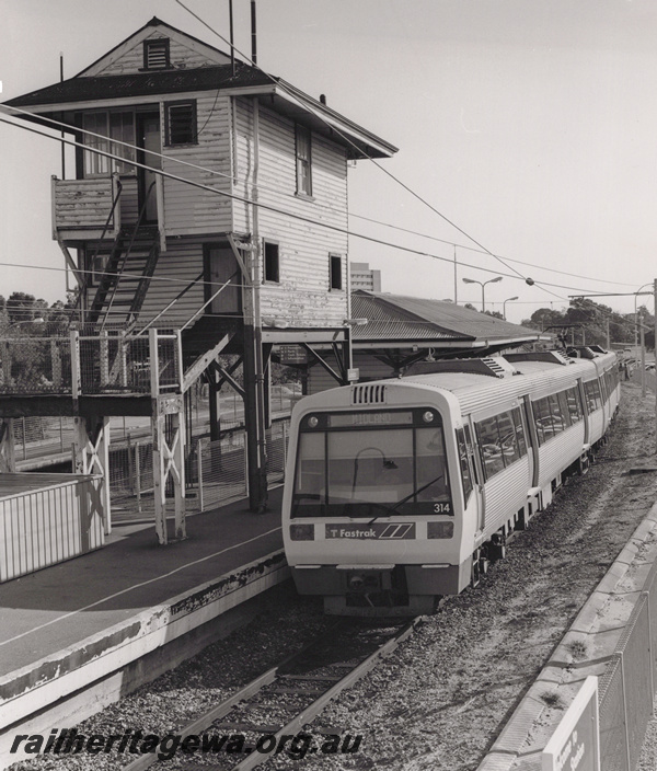 P20854
AEB class 314 EMU trailer, signal box, station building, East Perth, ER line, overall view of the train and station
