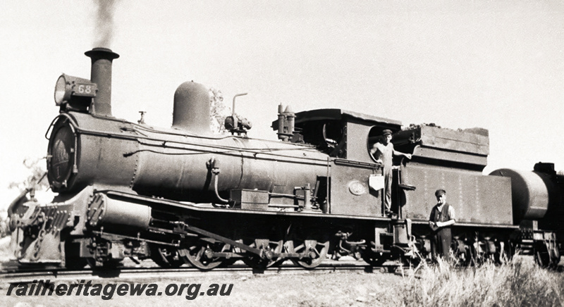 P20890
Commonwealth Railways NFC class 68 operating on the North Australia Railway  at an unknown location. Note the locomotive tender is fitted with  