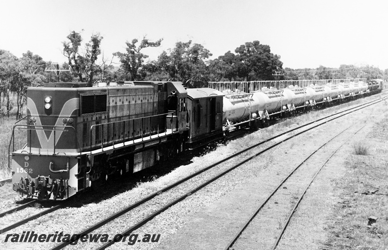 P20900
D class 1562 haul a caustic acid train  through Keysbrook. SWR line. 
