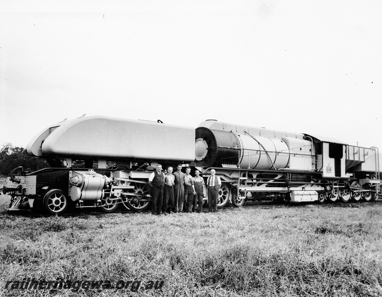 P20936
ASG class 49, workers posing in front of the loco, front and side view. See also P00515 and P14878
