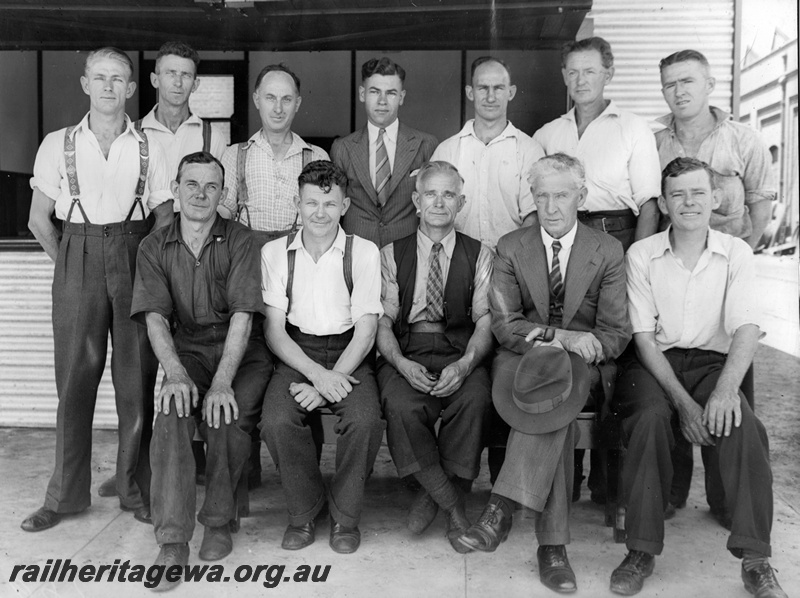P21232
Group photo of an un-named committee at the WAGR's Midland Workshops: Back row, A. Risbey, J. Shepperd, A. Woods, J. Craig (auditor), L. Thornhill, A. Marshall, W. Wright. Front Row, L. Hasluck (treasurer), J. Pull (secretary). J. Millar (chairman), R. N.  Johnston (Works Manager), F. Richardson (vice chaiman. taken between 1935 & 1940
