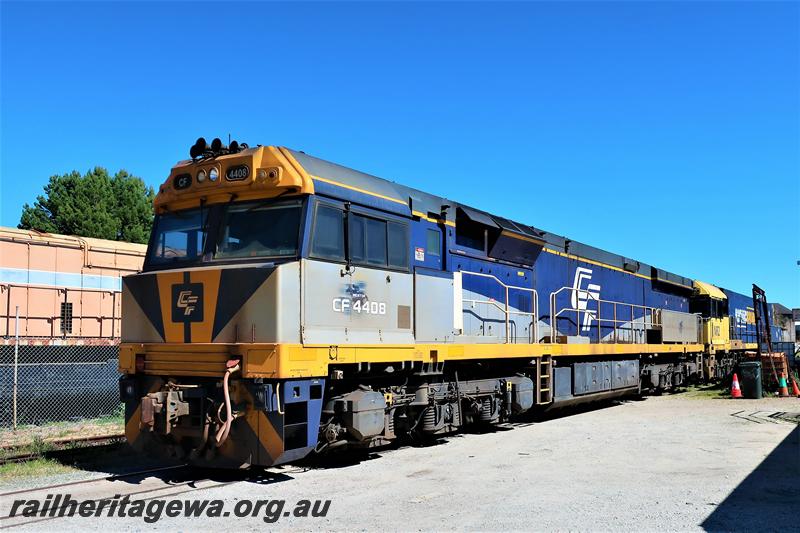 P21539
CFCLA loco CF Class 4408 in the blue, grey and yellow livery passing through the site of the Rail Transport Museum en route to the plant of UGL, front and side view
