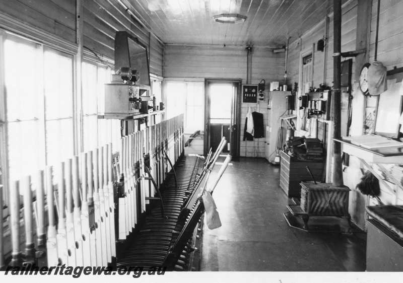 P21644
Interior view of main floor inside signal Box B, lever frame, block instrument, track diagram, Midland, ER line
