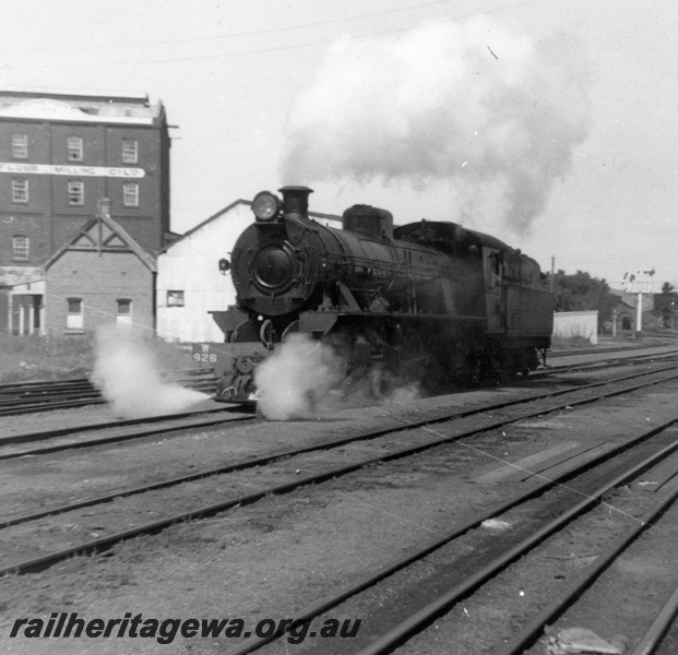 P21850
W class 928, on Australian Railway Historical Society Greenhills excursion, bracket signals, tracks, trackside buildings, York, GSR line, front and side view
