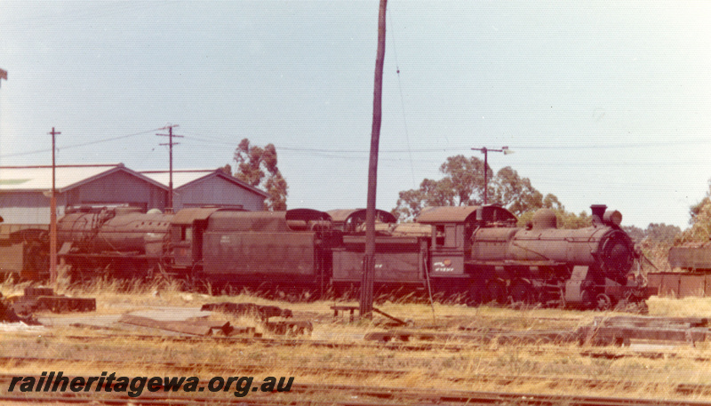 P21893
F class 422, V class loco, on scrap road, sheds tracks, loco depot, Midland, ER line, side and end views
