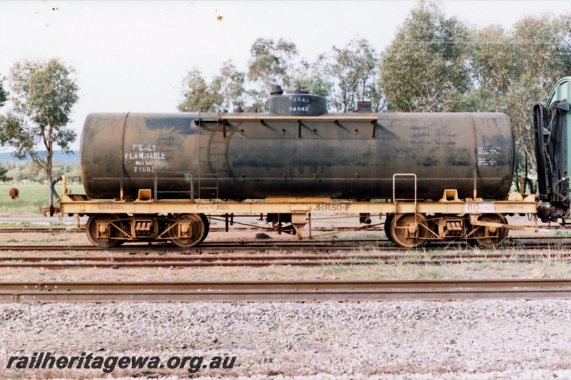P21955
JHR class 50-F bogie tank wagon, Pinjarra, SWR line, side view
