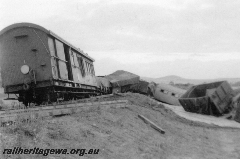 P22267
Bringo Crash, 2 of 2, ZA class brakevan,  wagons derailed, track torn up, Bringo, NR line, view from rear of train at track level 

