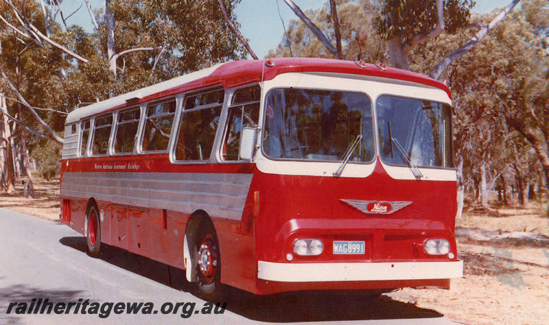 P22847
WAGR Hino bus WAG8991, standing on roadway, side and front view
