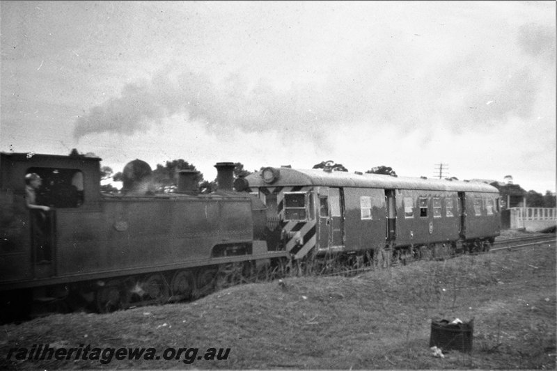 P22883
K class loco, ADG class railcar in original livery with hazard stripes, East Perth, ER line, end and side view
